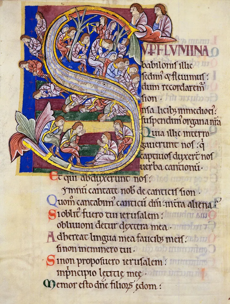 A page from an old manuscript with an elaborately decorated letter 'S.'